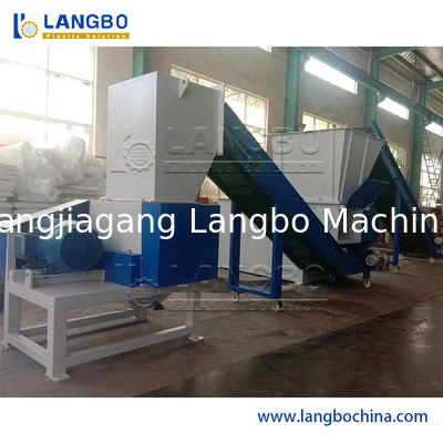 Dwukierunkowa kruszarka do odpadów z tektury, papieru, opon, gumy, złomu metalowego, drewna, brył, beczek, bębnów, rur i tworzyw sztucznych do recyklingu